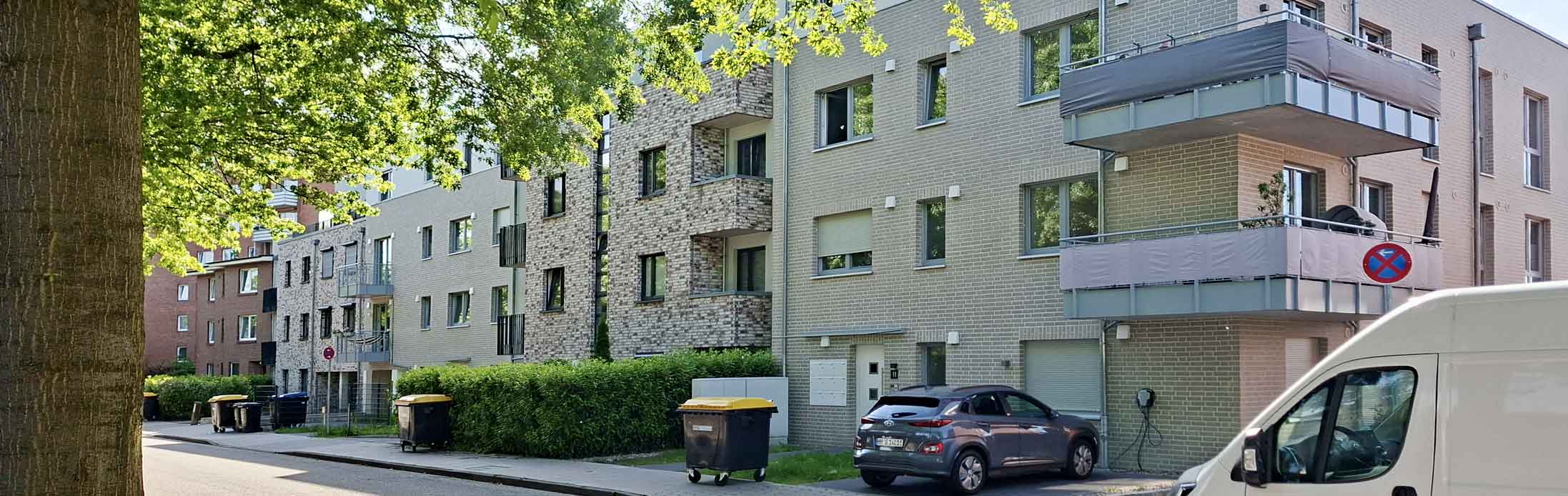 WOHNUNGSBAUNeubau Lohof 5,9 und 11 | WedelStraßengesamtansicht